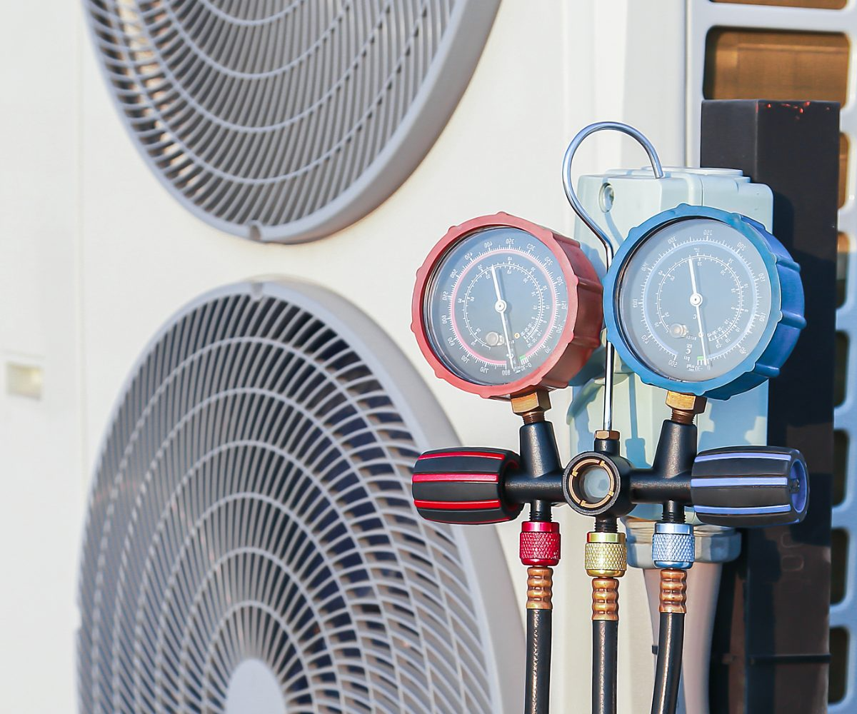 air conditioner technician checking air conditioner operation 1 1.webp