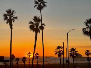 heat wave shimmering over Orange County suburban street in summer - why your ac bill spikes during heat events