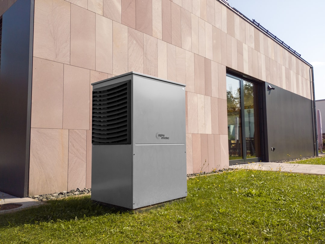 heat pump compressor outdoor unit in sunny backyard - why your heat pump compressor fails and what to do
