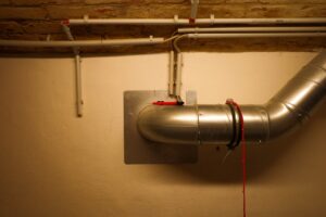 leaky ducts wasting energy in a home