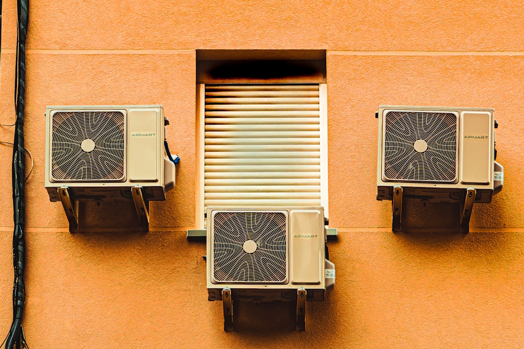 central air conditioning unit outside an Orange County home on a sunny day