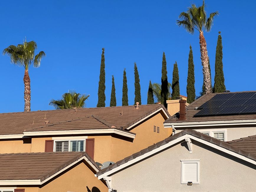 Southern California outdoor AC unit under bright summer sun in Orange County