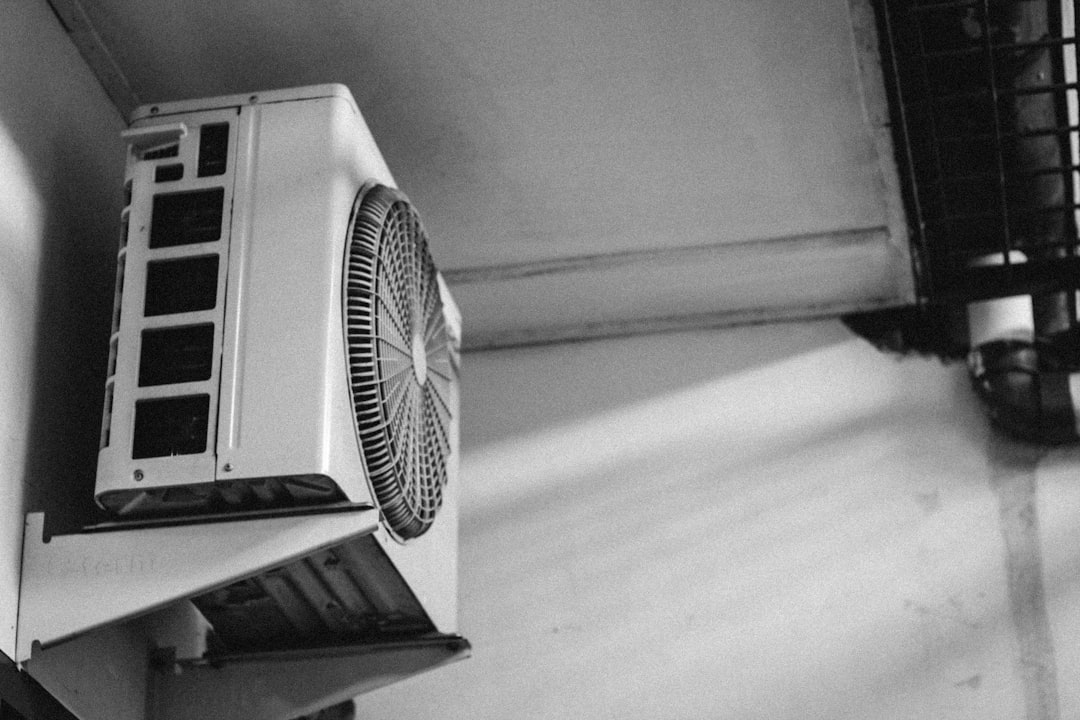 modern high-efficiency AC unit in an Orange County backyard